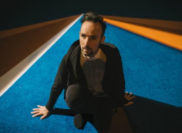 Holcombe Waller posing on the carpeted deck of his spaceship: Photo by Tyler Kalberg