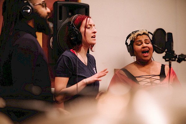 Sarah Clarke of Dirty Revival (right) recording vocals with Darian Anthony Patrick and Laryssa Birdseye on her first-ever solo song, "Take My Time," at Blue Heron Studio on January 16—click to see more behind the scenes photos by Jason Quigley