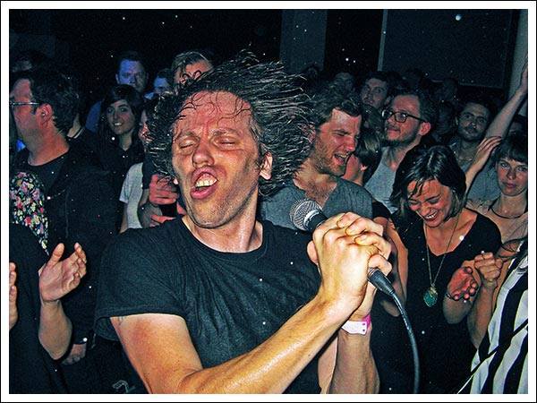 A typically sweaty Offer showers the audience in a little bit of his juices: Photo by Andreas Guettel