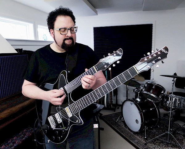 Hershel Yatovitz, lead guitarist for for pop singer Chris Isaak, with his intimately custom Koll: Photo by S. Yatovitz